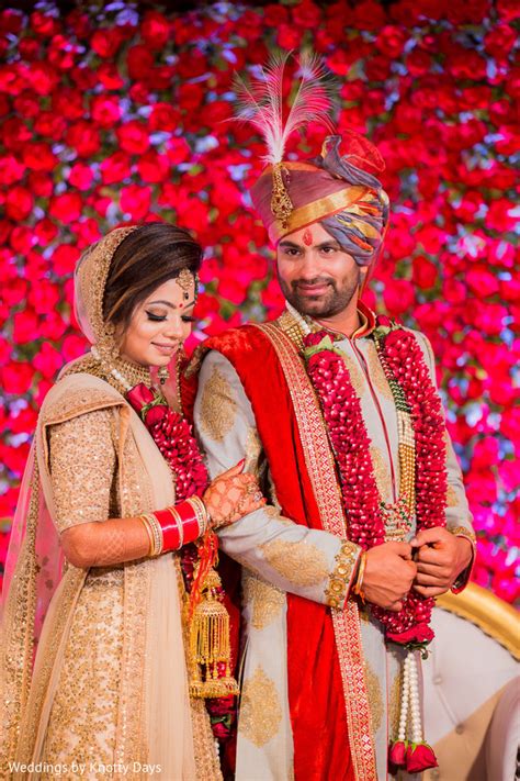 Majestic Indian Bride And Groom On Their Wedding Ceremonial Outfits