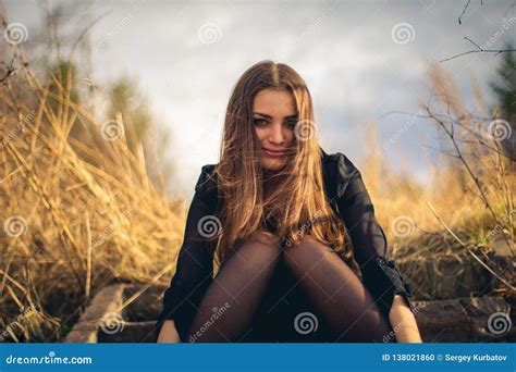 A Beautiful Brunette Girl Sitting On Stairs Autumn Stock Photo Image