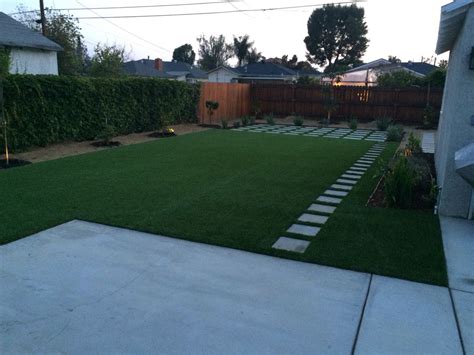 Artificial Turf With 12x12 Pavers Walkway And Drought Resistant