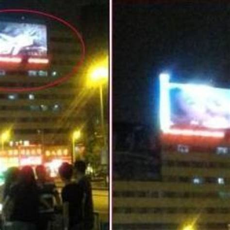 Erotic Film Broadcast To Hundreds Outside Railway Station South China