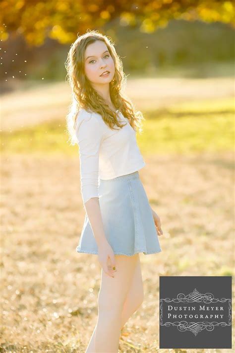 Gorgeous Female Senior Portraits Blue Skirt White Button