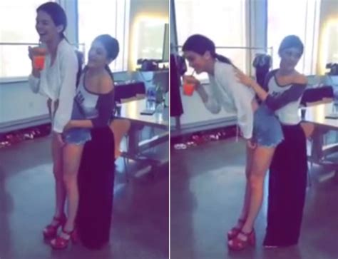 Kylie Jenner Puts Her Hand Down Her Sister Kendell Jenners Shorts On