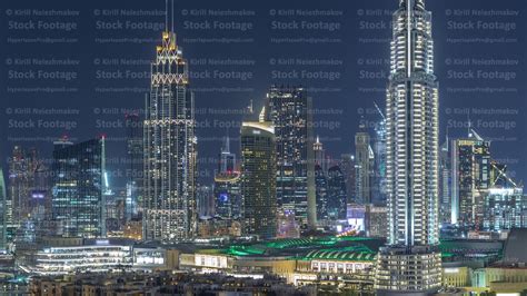 Aerial Nighttime Cityscape With Illuminated Architecture Of Dubai