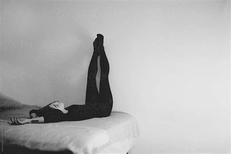 Young Woman Lying In The Bed By Stocksy Contributor Marija Kovac