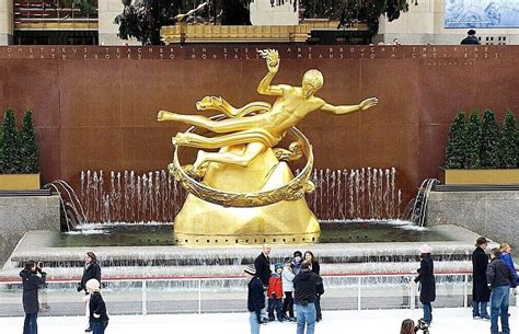 Prometheus Sculpture And Fountain At Rockefeller Center