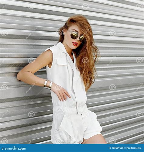 Outdoor Fashion Portrait Of Stylish Young Woman In Sunglasses Stock