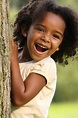 African American Child. Happy African American child playing in a park ...