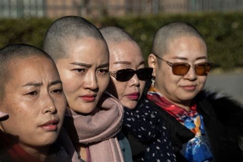 Wives Of China S Lawyers And Activists Go Bald To Protest Husbands