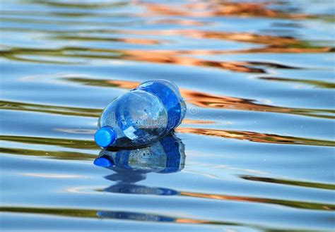 The Floating Bottle Stock Image Image Of Water Background 5709747