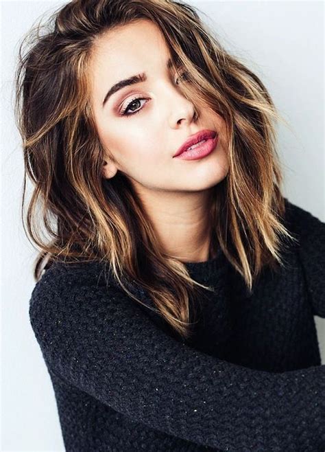 The wavy brown hair that's styled with a dash of blonde and just a bit of red will make heads turn for sure. 1001 + Ideas for Brown Hair With Blonde Highlights or Balayage