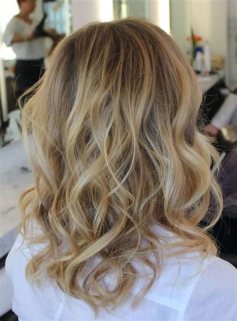 This bouncy layered medium length hair was permed and wrapped in an effortless ringlet style. 30. Medium Hair with Loose Waves - Summer Hair: Loose ...