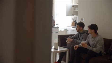 Group Of Students Eating Breakfast In Shared House Stock Video Footage