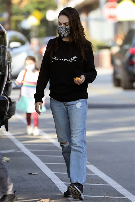 Mila Kunis Wears A Feminist Sweater While Out Running Errands In Beverly Hills California