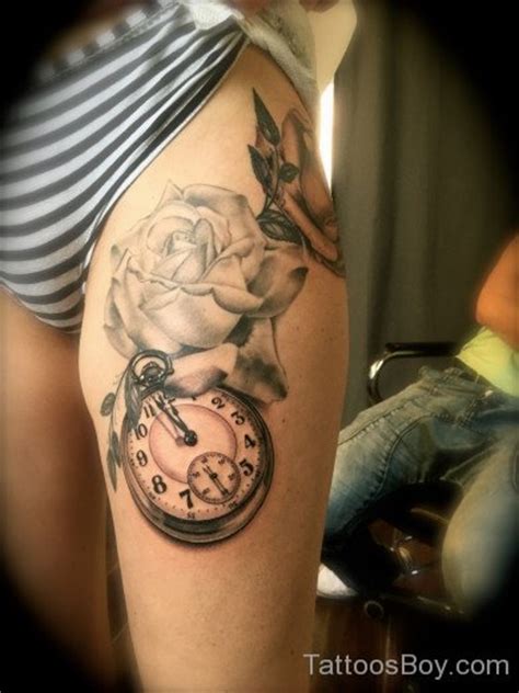 Rose And Clock Tattoo Design On Thigh Tattoo Designs Tattoo Pictures