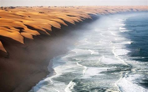 The High Sand Dunes Of Namib Desert Meeting The Sea The Coastal Desert