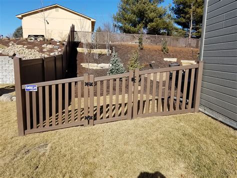 Brown vinyl coating over galvanized chain link has the ability to blend in with the background of natural landscaping. Beautiful chestnut brown woodland select vinyl fencing ...