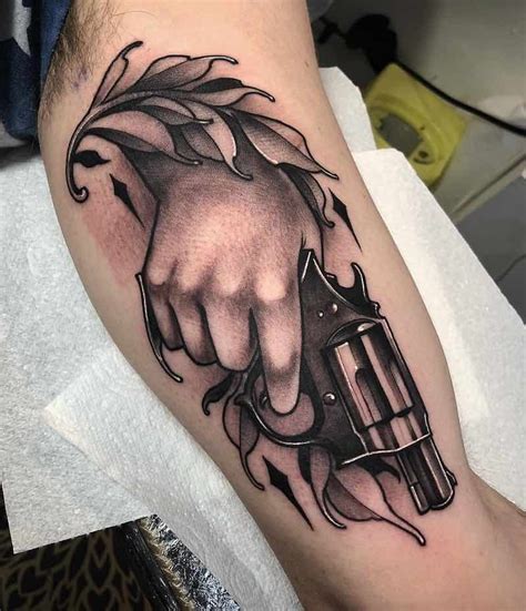 Aggregate 68 Tattoos Of Guns On Hands Latest Vn