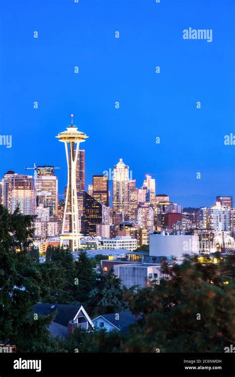 Seattle Cityscape With Mt Rainier In The Background At Dusk