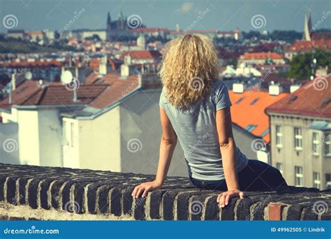 Girl Sitting On The Roof Of A House Stock Image Image Of Expression
