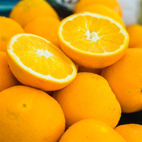 Free Photo Close Up Of Ripe Juicy Oranges
