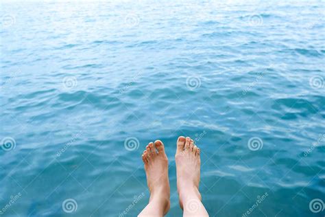 Feet Top View In The Aqua Blue Water Background Abstract Beautiful