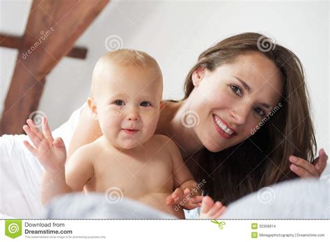 Happy Mother And Baby Waving Hello Stock Photo Image Of Close Enjoy