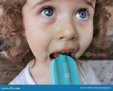 Little Girl Enjoying Her Blue Popsicle Stock Photo Image Of Beautiful