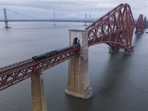 The Iconic Flying Scotsman Crossing The Forth Rail Bridge Scotland R