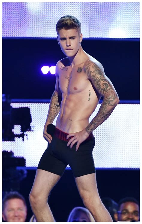 Justin Bieber Strips Down To Calvin Klein Underwear At Fashion Rocks 2014