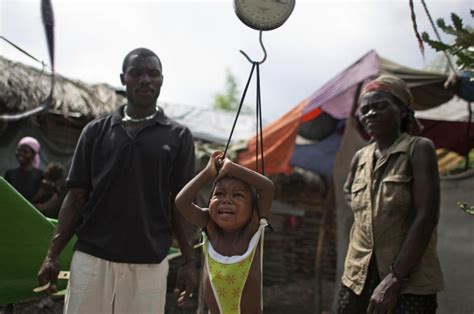 Immagini Forti La Denutrizione Dei Bambini Di Haiti Libero Quotidiano
