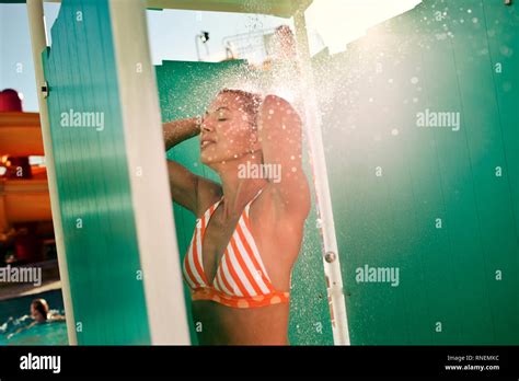 Woman Enjoying Outdoor Shower Hi Res Stock Photography And Images Alamy