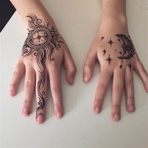 This red and black henna tattoo paints a trail from the wrist towards the index finger. 150 Incredible Henna Tattoo Designs (Ultimate Guide, June ...