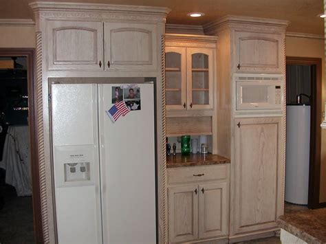 Antique white kitchen cabinets can create a dreamy vibe in your kitchen and are a great way to calm a usually hectic space. pickle wash cabinet | Pickled Cabinets Pictures | Kitchen ...