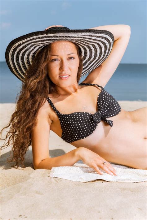 Woman In Bikini Lying Down And Sunbathing On The Beach Stock Image Image 40108683