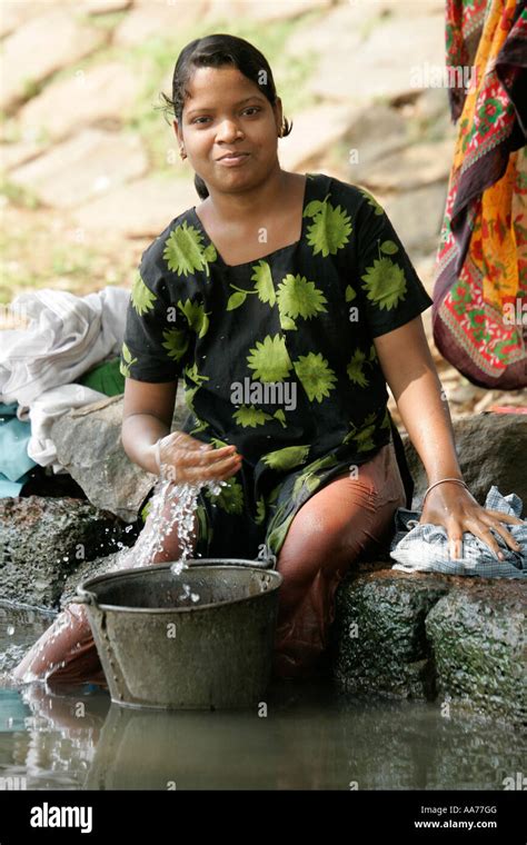 Woman Washing At Bolgarh Village Orissa India Stock Photo Alamy