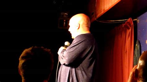Funny Bald Short Fat Guy Performing Stand Up At Comedy Showcase In