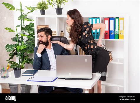 Flirting At Work Assistant Flirting With Manager Sitting On Desk Flirty Woman And Shy Man