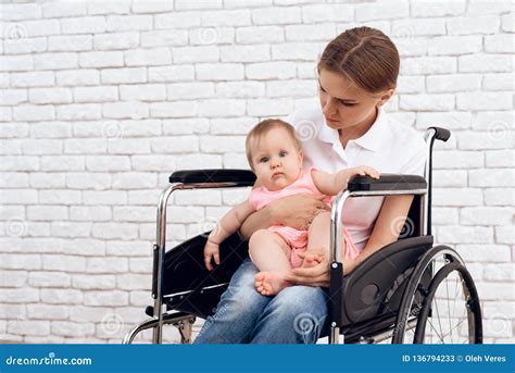 Disabled Mother In Wheelchair With Newborn Baby Stock Image Image Of