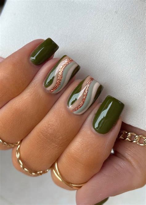 40 Trendy Ways To Wear Green Nail Designs Olive Green And Gold Swirl