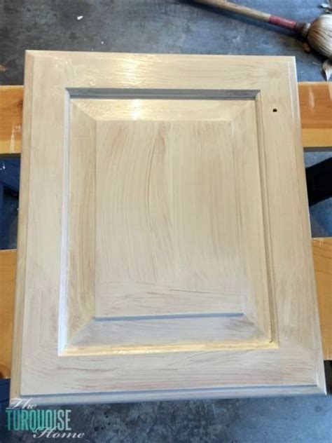 Paint the backs of the cabinet doors first. How to Prime Cabinets for a Smooth Finish | Kitchen paint, Painting kitchen cabinets, Kitchen ...