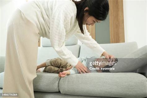 Mom Passed Out Couch Photos And Premium High Res Pictures Getty Images