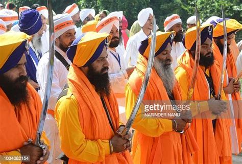 indian sikh holy men known as panj pyare hold swords as they escort news photo getty images