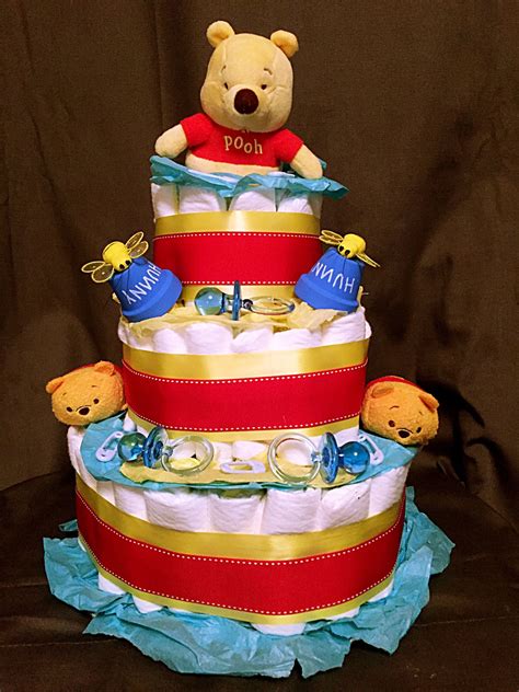 Perfect for a disney baby shower or 1st birthday party. Winnie the Pooh Diaper Cake | Disney baby shower, Baby ...