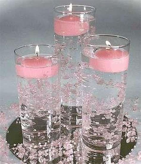 40 Diy Floating Candles Crafts Ideas In 2020 Candle Wedding Centerpieces Non Flower