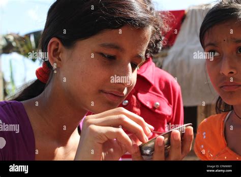 A Girl Getting Ready To Put Tika On Her Brothers Forehead During Bhai Tika The Fifth Day Of