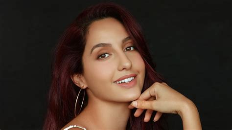 Her mother has indian roots. Nora Fatehi Smile Wallpaper 43435 - Baltana