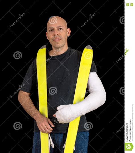 Young Man In An Arm Cast After An Alipne Skiing Accident Stock Image