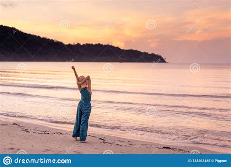 Woman Relaxing On The Beach With Sunset In Koh Kood Island Stock Image