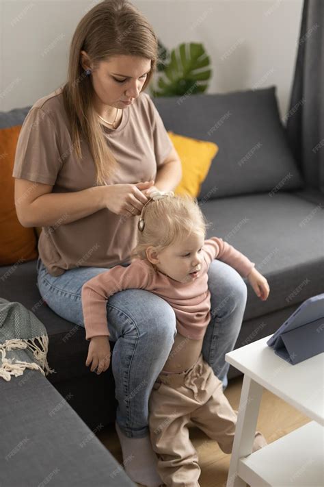 Premium Photo Deaf Child Girl With Cochlear Implant Studying To Hear