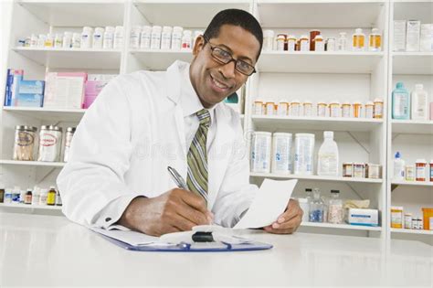 Male Pharmacist Working In Pharmacy Stock Photo Image 29665930
